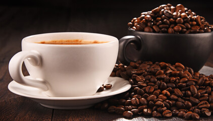 Composition with two cups of coffee and beans