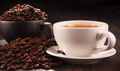 Composition with two cups of coffee and beans