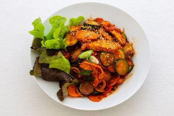 Stir fried with pork and vegetables sprinkle sesame seeds