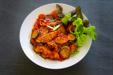 Stir fried with pork and vegetables sprinkle sesame seeds