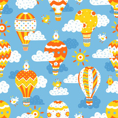 Cartoon seamless pattern with hot air balloons, birds, sun and clouds. Cute background for kids 