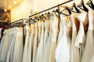 many Evening dress Of the bride In wedding studio shop
