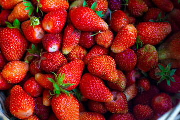 Strawberries in a wicker basket, background