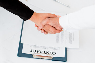 Close-up of two shaking hands