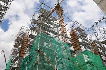 KUALA LUMPUR, MALAYSIA -JULY 29, 2019: Scaffolding is installed on the construction site as...
