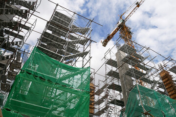 KUALA LUMPUR, MALAYSIA -JULY 29, 2019: Scaffolding is installed on the construction site as...