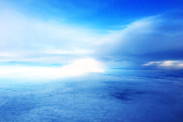 Fototapeta premium beautiful landscape view background of sky above cloud when look from plane's window
