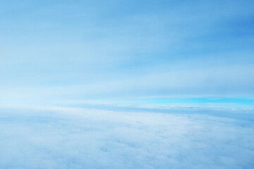 beautiful landscape view background of sky above cloud when look from plane's window