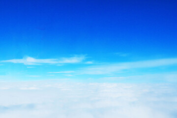 beautiful landscape view background of sky above cloud when look from plane's window