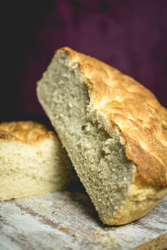 Freshly Baked Loaf of Bread Split in Two.