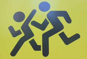 Abstract symbol of running people. Russia.
