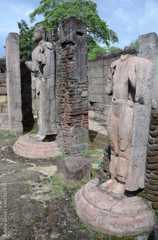 Canvas Prints Vertical shot of Buddha statues at the Ruins of an Ancient City Polonnaruwa, SrÃ­ Lanka