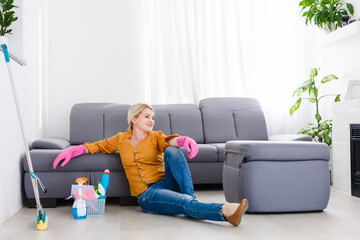 Portrait Of Young Woman Mopping Floor At Home