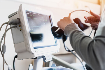 Nursing using ECG-Heart rate pulse monitor for patient in self-quarantine room in hospital self...