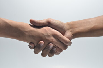 Hand Shake of two persons on isolated white background