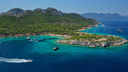 Aerial drone photo of secluded paradise bay and small island of Moni with turquoise crystal clear beach next to Aigina, Saronic gulf, Greece