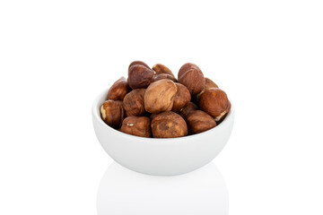 Hazelnut. Shelled hazelnut in white bowl, on white background (Tr- findik)
