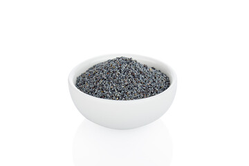 Poppy seeds. Blue poppy seeds in white bowl, on white background (Tr- hashas)

