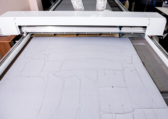 Fabric industry production line. Textile factory. Working tailoring process 