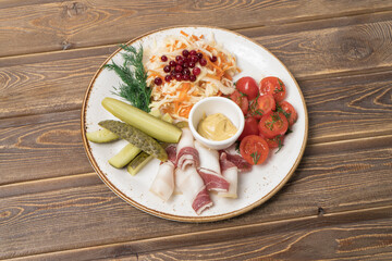 Assorted pickles cucumbers, tomatoes, lard, onions to vodka.