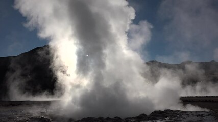 Chile. Spring with natural thermal water produces hot steam at sunrise at the famous El Tatio geyser valley at 4320 meters above sea level.