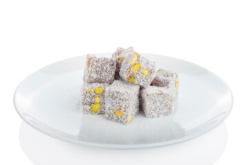 Turkish delight, pistachio delight in white plate on background
