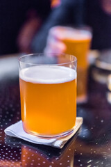 Glass of beer with blur background