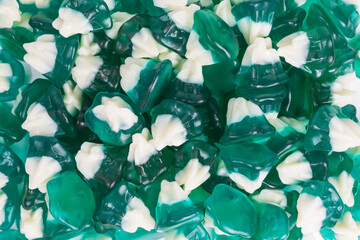 background of green and white iceberg gummy candy