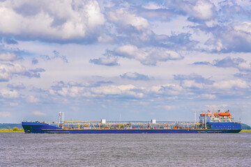 Fototapeta premium cargo barge transporting liquefied gas by sea