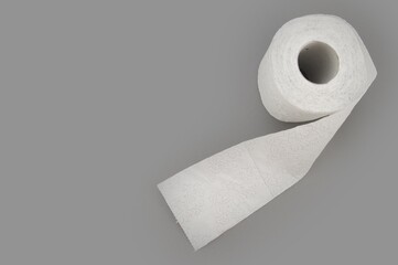white toilet paper on gray background.white toilet paper on gray background. Toilet paper crisis due to coronavirus COVID-19 quarantine.