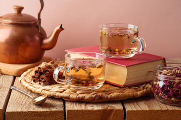 Dry herbal tea on wooden table. Healthy lifestyle concept.