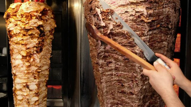 Shawarma meat being cut before making traditional Turkish Doner Kebab in Turkey