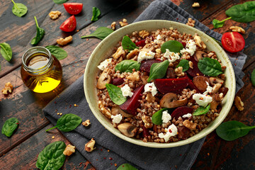 Buckwheat and beetroot salad with mushroom, walnut, spinach and feta cheese. healthy diet food