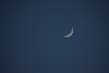 Obraz na płótnie Canvas moon in the clear blue sky