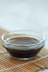 Soy sauce on a bamboo napkin