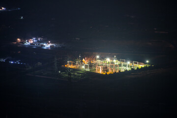 Night scene of power station. Zoom shot. Long exposure. Selective focus