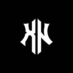 XN monogram logo with a sharp shield style