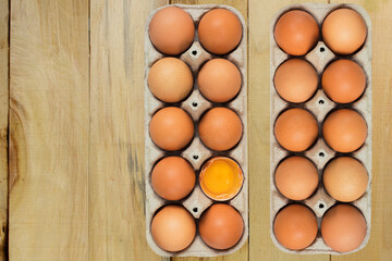 Fresh and raw chicken eggs in a tray