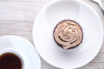 high angle view of cup cake on plate 