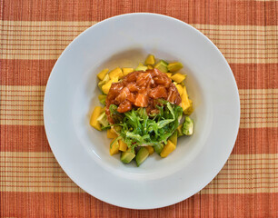 Brown rice salad with tuna, mango, avocado and seaweed