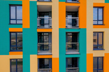 Fototapeta premium Detail facade with windows. Simple high-rise residential typical building