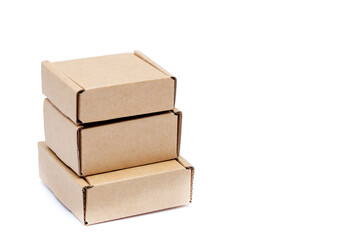 Cardboard boxes of various sizes isolated on white background.