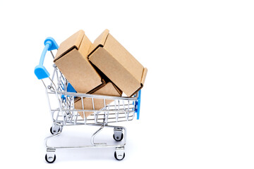 Shopping cart full of cardboard boxes, isolated on white background