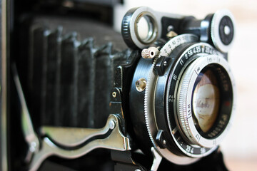 Fototapeta na wymiar The lens of an old film camera