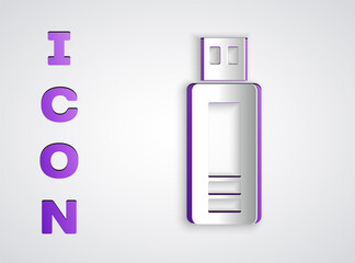 Paper cut USB flash drive icon isolated on grey background. Paper art style. Vector.