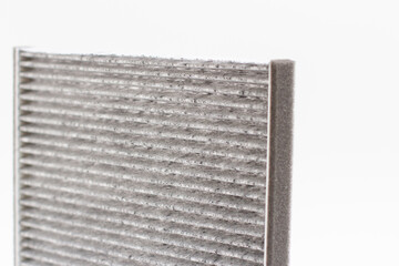 Close-up of Carbon car air filter on white background