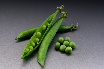green peas on the grey background