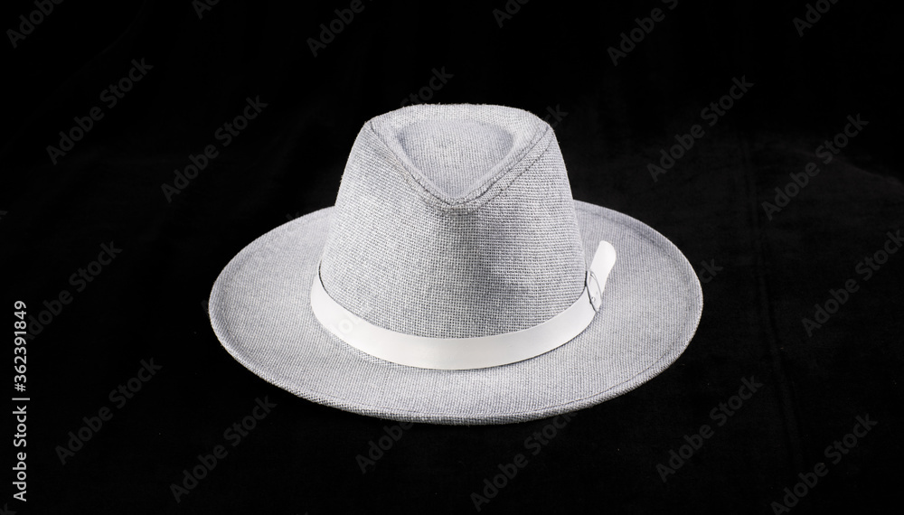 Canvas Prints white straw hat isolated on black background