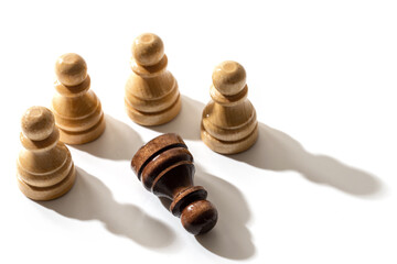 One black chess pawn among whites. Concept of racism and discrimination.