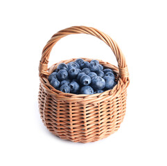 Fototapeta na wymiar Fresh tasty blueberries in wicker basket isolated on white